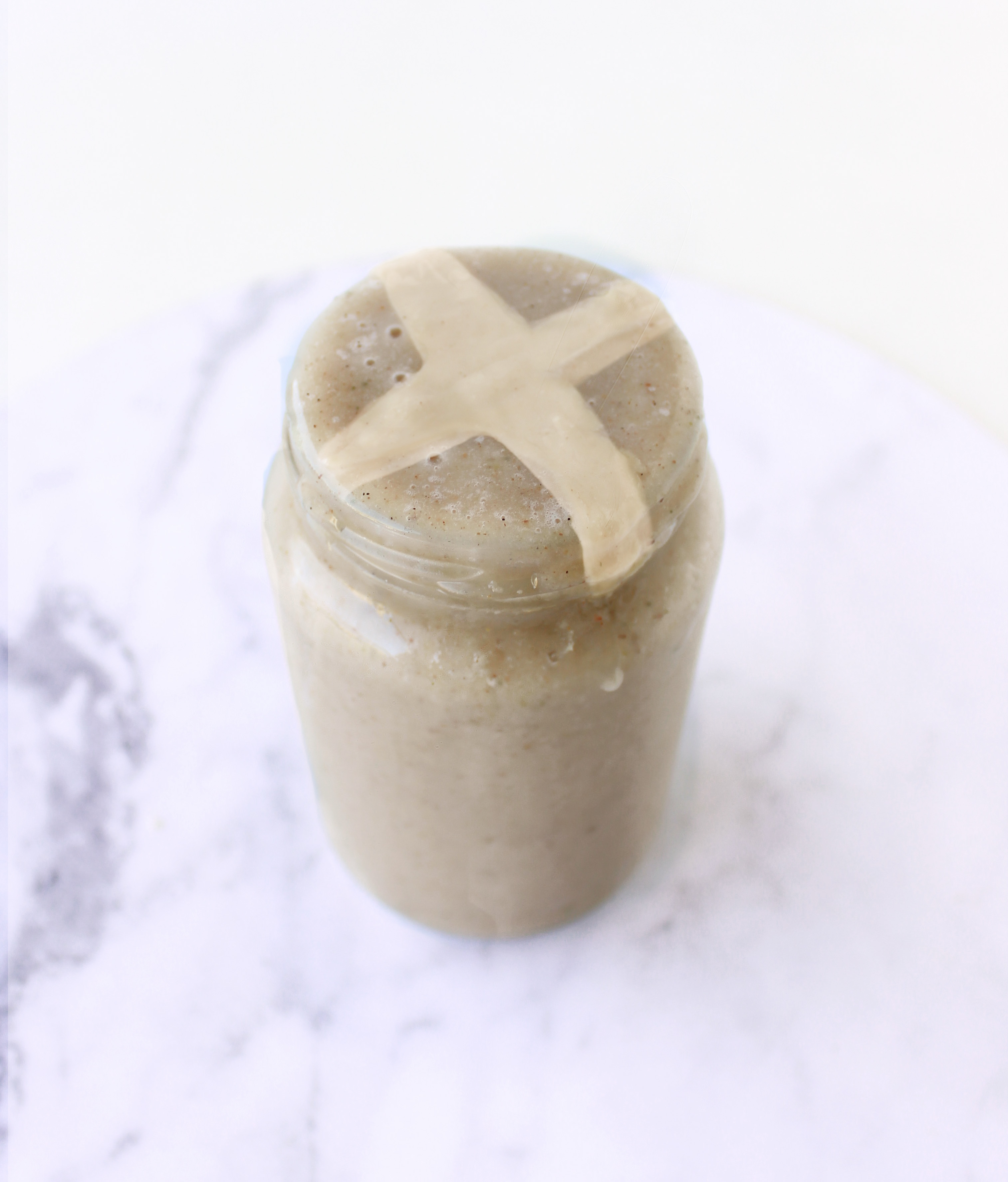 A jar full of delicious, creamy hot cross bun flavoured smoothie.