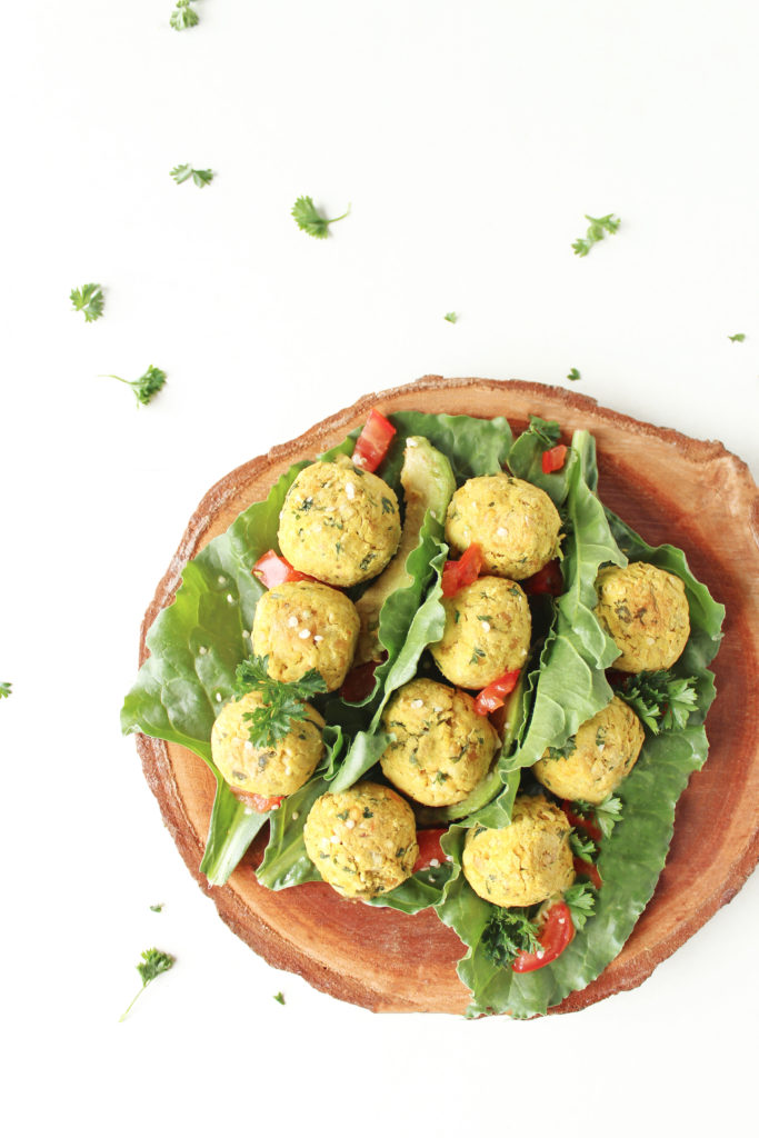 Simple and easy vegan baked falafel recipe - oil free, gluten free. Healthy plant based lunch, snack, salad topper or nourish bowl element. A delicious way to eat more vegetables.