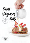 Easy vegan eats recipe e-cookbook by FoodieeGee cover featuring strawberries and cream vegan French toast with maple syrup
