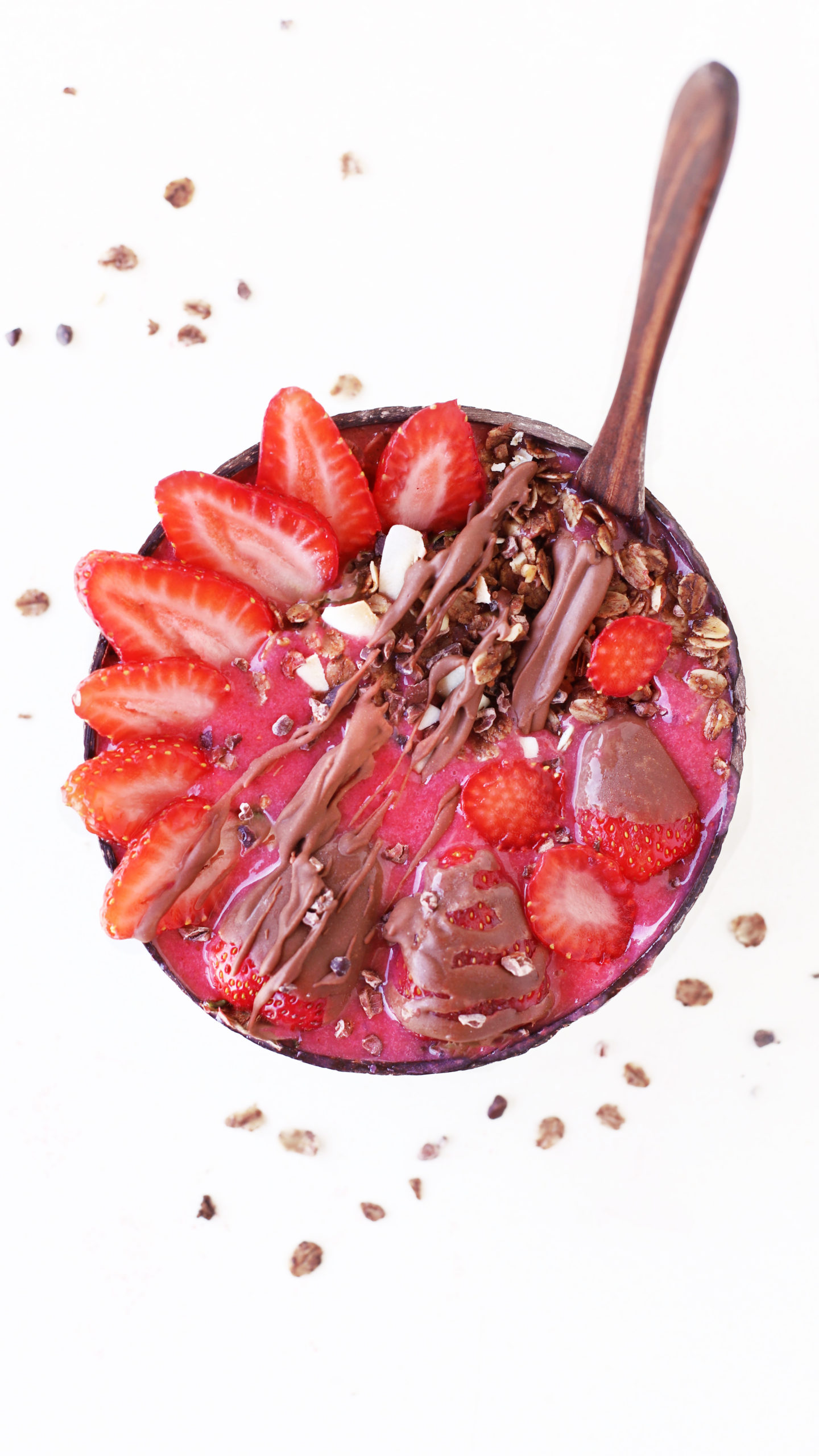 chocolate covered strawberry smoothie bowl for a healthy gluten free vegan breakfast bowl in a coconut bowl