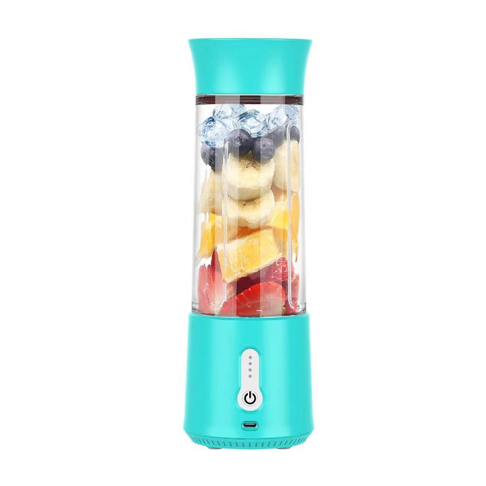 mini portable blender filled with fruit and healthy smoothie ingredients